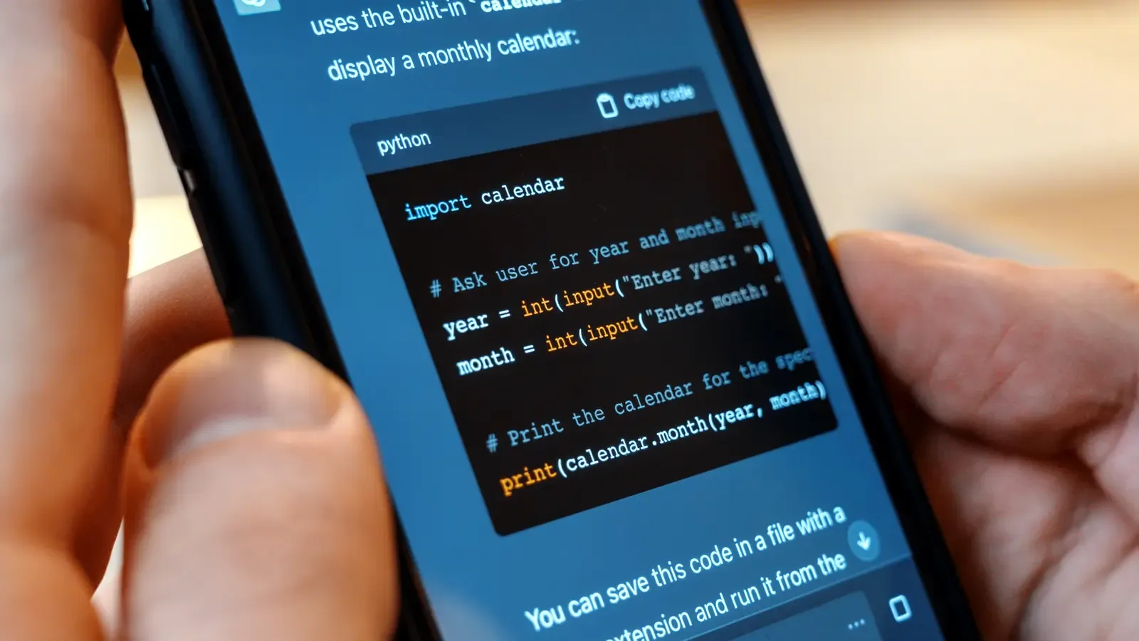 A phone showing an AI assistant chat answer