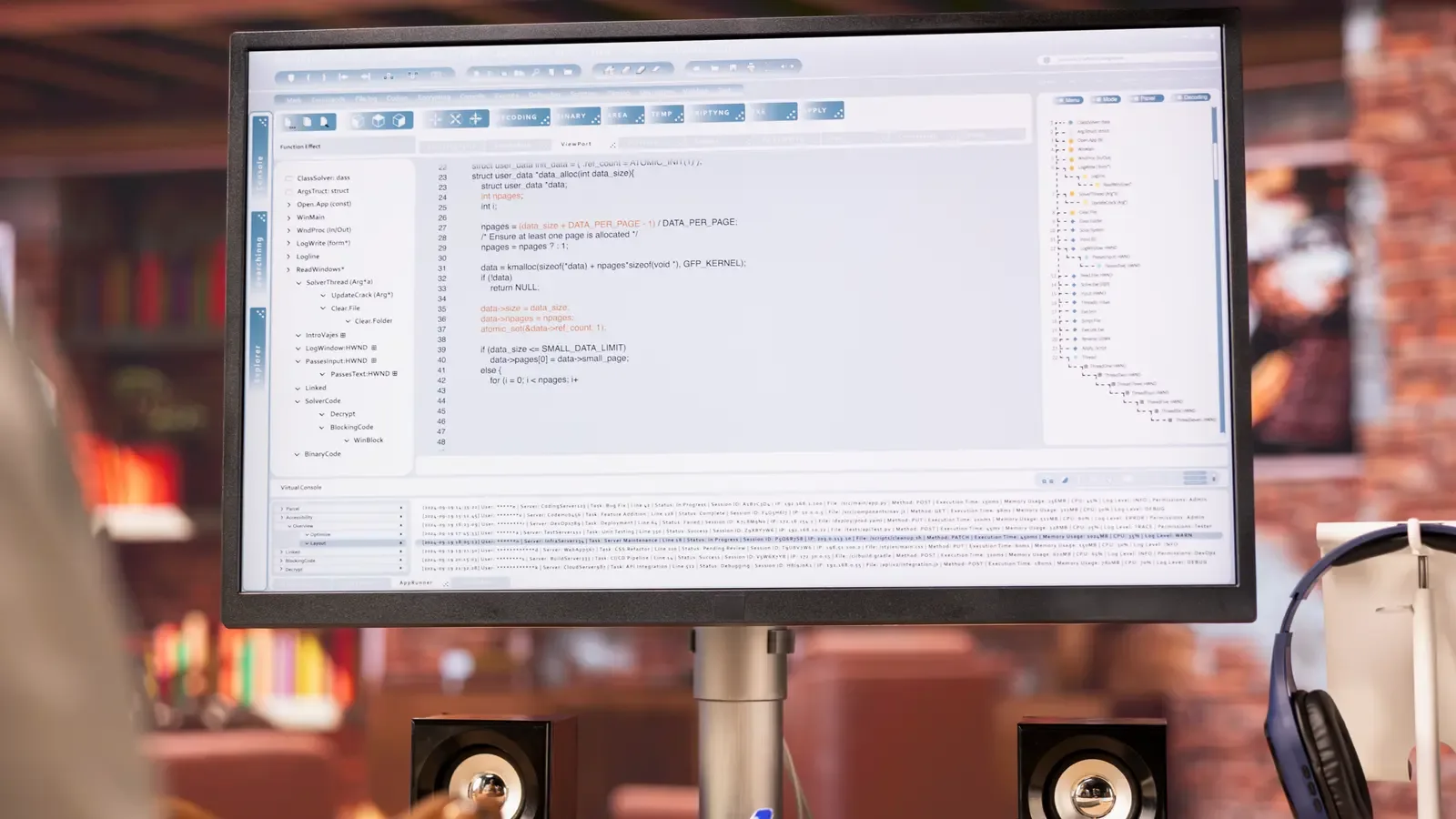 A monitor showing website code and text files